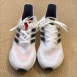 Adidas white, black and orange ultraboost sneaker